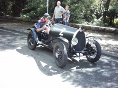 The Bugati World Rally passing by Fitzroy Falls....